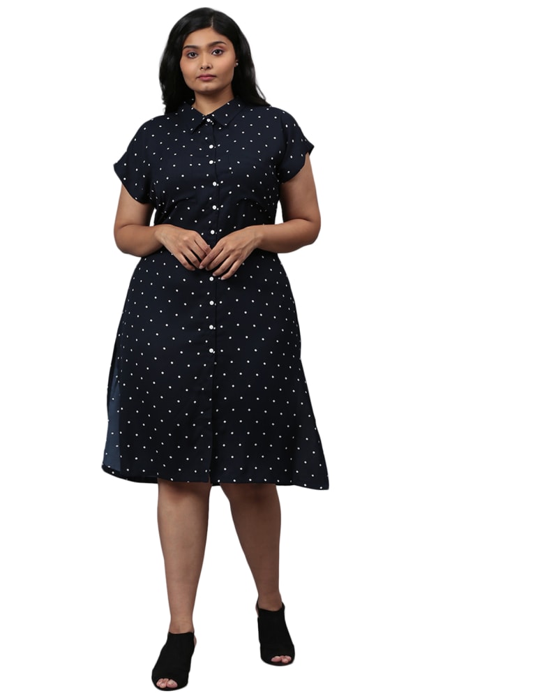 Front of a model wearing a size 4XL Blue Polka Dot Front Button Dress in Blue by Instafab Plus. | dia_product_style_image_id:297460